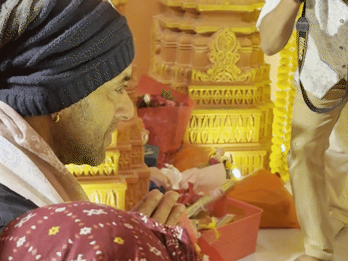 Salman Khan seeking Bappa's blessings.