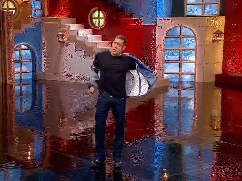 Salman Khan taking off his jacket on stage.
