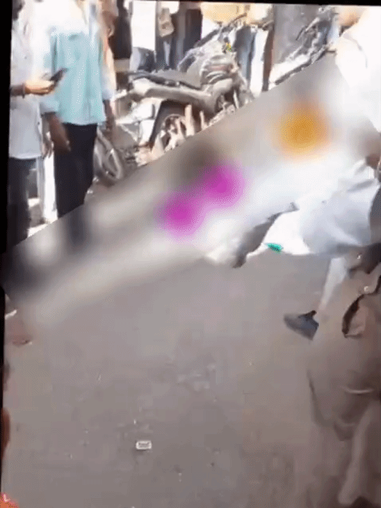 Police personnel seated the young man on a motorcycle and began taking him to the police station.