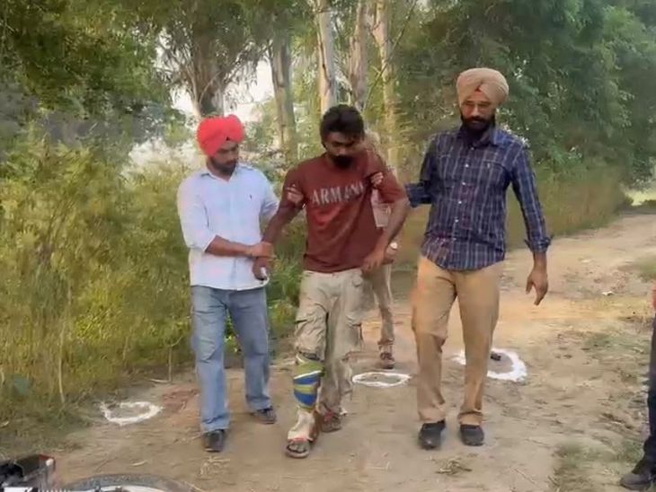 गैंगस्टर हरमन बोपाराय को पकड़कर ले जाती पुलिस।