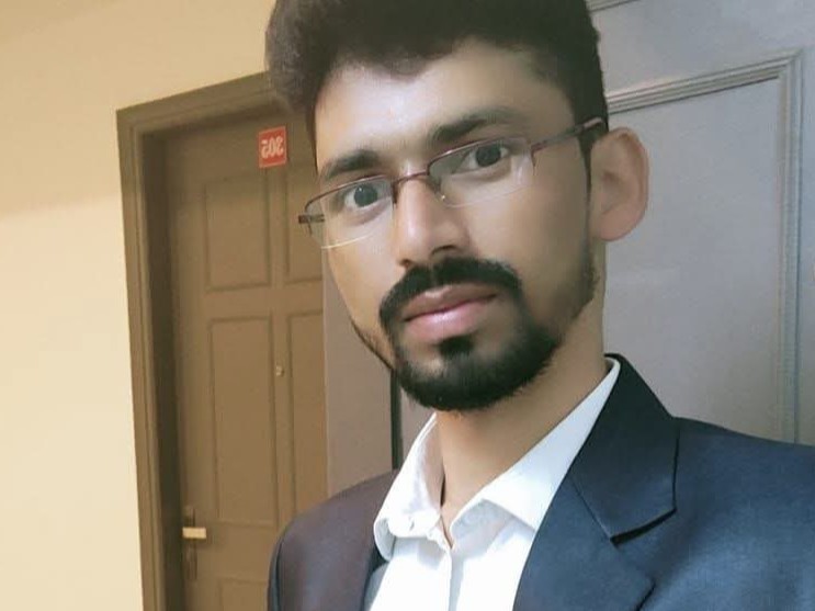गिरफ्तार वीरेंद्र की फाइल फोटो। आरोपी पिछले चार साल से गया कॉलेज में कंप्यूटर ऑपरेटर के रूप में काम कर रहा था।