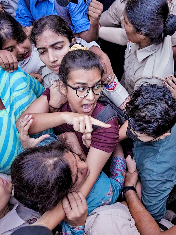 AISA President Neha Bora had gone to protest at Mandi House. The police took him into custody.