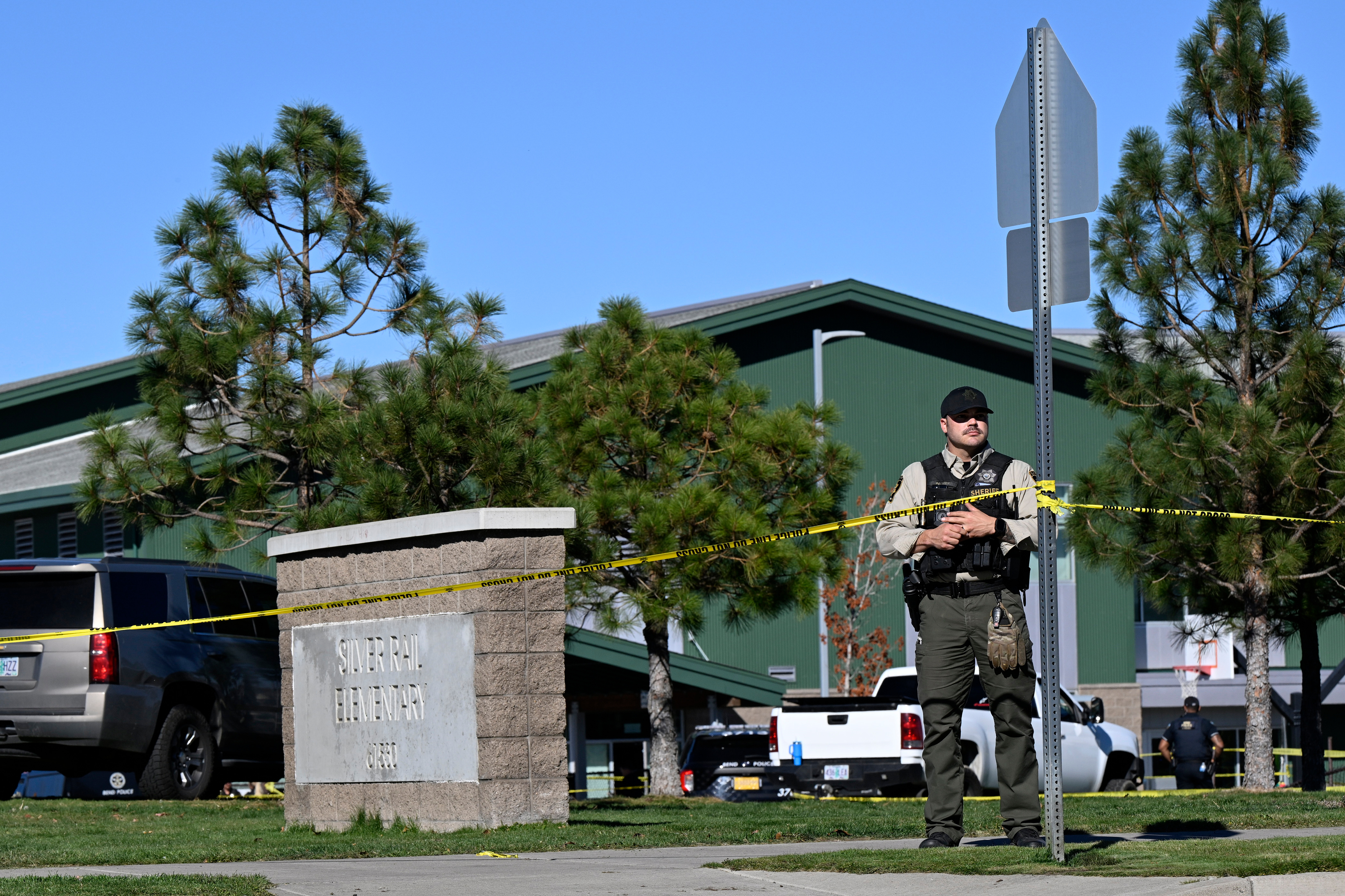 Police deployed outside the school after the firing incident.