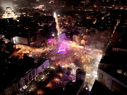 People gather to celebrate at Slavia Square after the election victory in Belgrade, Serbia. The picture is of 25 October 2026.