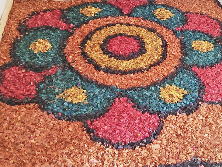 An attractive rangoli is made in Somnath by collecting the wooden sole ...