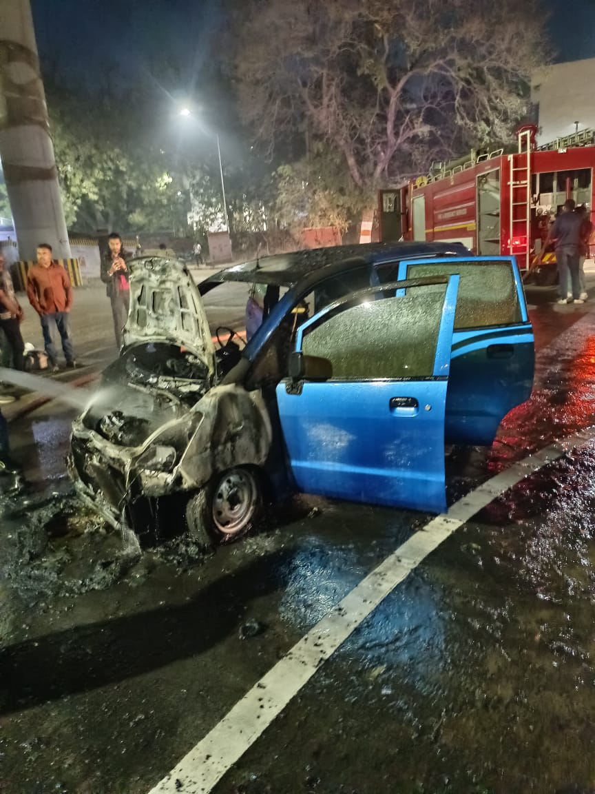 Car fire in front of Gandhinagar's old secretary gate, driver rescued
