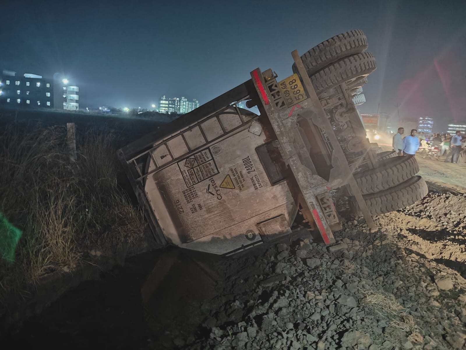 A tanker loaded with chemicals overturned after the driver lost control ...