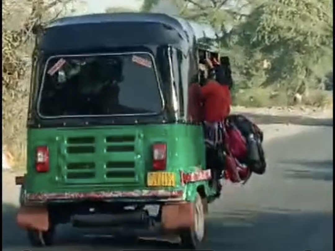 Motorized Rickshaw Overloading Video of driver overloading rickshaw with more students than capacity ...