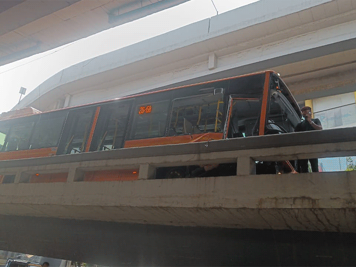 Surat BRTS bus crashes into flyover railing Passengers panic as bus ...