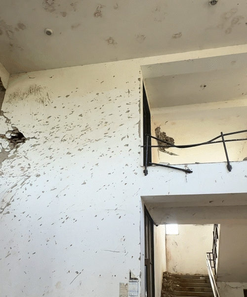 Where the plane's tail was removed, there is still a large hole today,