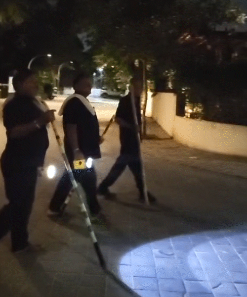 Security guards moving in groups due to fear of leopard.